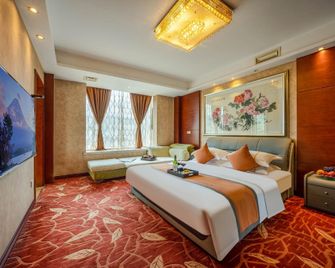 Ruihao Art Boutioue Hotel - Leshan - Bedroom