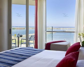 Kyma Suites Beach Hotel - Rethymno - Schlafzimmer