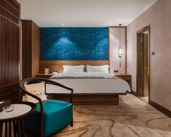 Wenzhou Hotel - Guiyang - Schlafzimmer