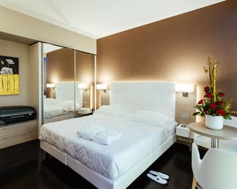 رافايللو هوتل - سينيغاليا - غرفة نوم