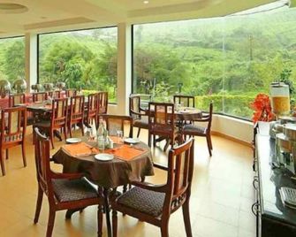 Hotel C7 Munnar - Munnar - Restaurant