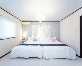 Awaji Central Inn Kuruma713 - Awaji - Schlafzimmer