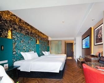 Zhangjiajie Metropolo Hotel - Zhangjiajie - Bedroom