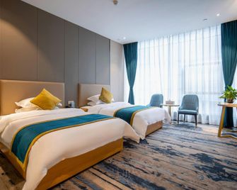 Jiang Hua International Hotel - Tongren - Bedroom