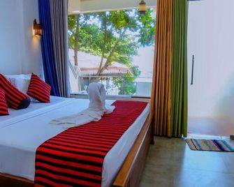 Coral Beach Hotel - Matara - Bedroom
