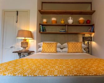 Masseria Ferarelli - 'Uttata' Room with Patio - Diso - Schlafzimmer