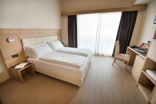 Hotel Silvestri - ליביניו - חדר שינה