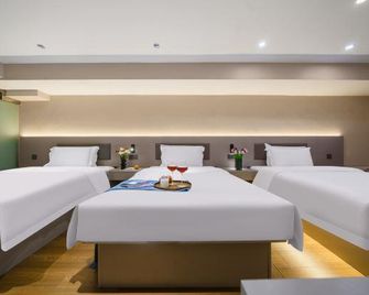 7 Days Premium·Chongqing Guanyinqiao Pedestrian Street Light Rail Station - Trùng Khánh - Phòng ngủ