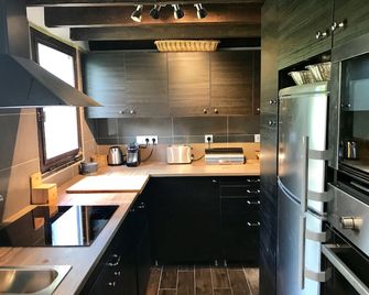 Grand chalet cosy, sauna & vue de rêve - Ban-sur-Meurthe-Clefcy - ห้องครัว