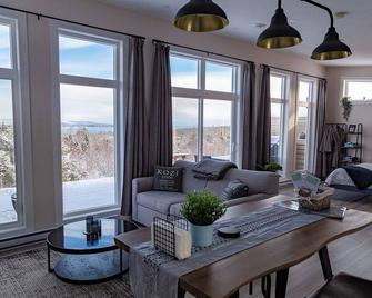 Piper's Creek Cottages - West Bay - Living room