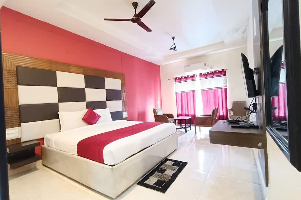 Hotel New Rajdarshan - מדיקרי - חדר שינה