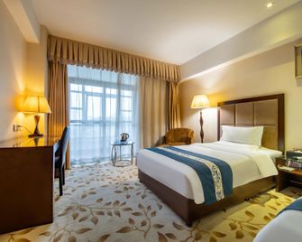 Huashan Licheng Hotel - Weinan - Habitación