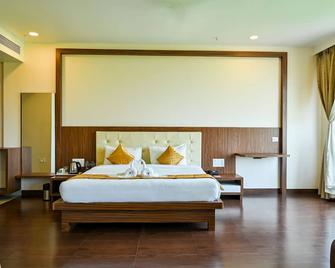 Hotel Laxmi Empire - Margao - Спальня