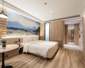 Home Inn Nanjing Jiangning Shangyuan Street Wanda Plaza - Nanjing - Bedroom