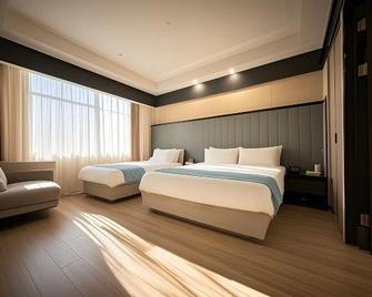 Tianci Hotel (Jiangsu Nanshan Park Xinzhi Hotel) - Jiujiang - Slaapkamer