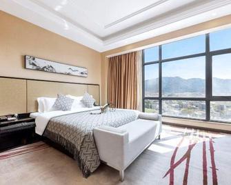 Yufeng International Hotel - Che-jüan - Ložnice