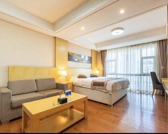 Times Starcity Apartment - Tchang-šan - Ložnice