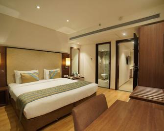 Cocoon Hotel - Pune - Bedroom