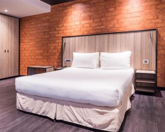 Onomo Hotel Maputo - מאפוטו - חדר שינה