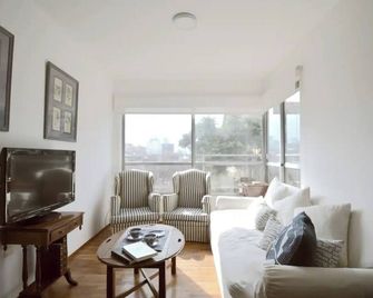 Beach and city in Montevideo. - Montevideo