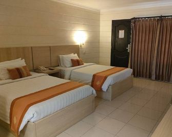 Hotel Mega Lestari - Balikpapan - Slaapkamer