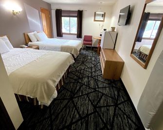 Woodland Inn & Suites - Medford - Bedroom
