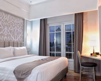 فيم باي زينا - سوراكارتا - غرفة نوم