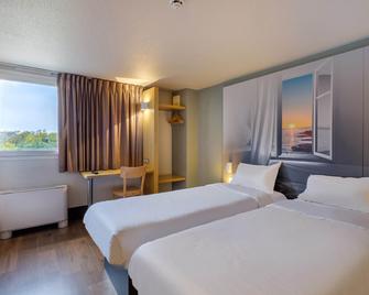 بد آند بريكفاست أوتل فريجوس بوجيه سور أرجونس - فريجو - غرفة نوم