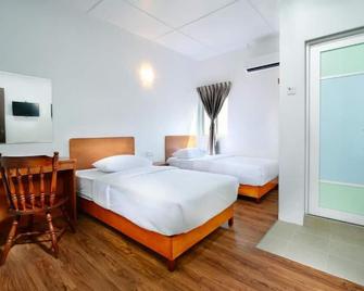 Mg Hotel - Mersing - Спальня