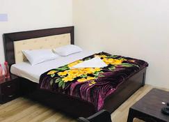 OYO 80702a Hotel Sunshine - Zerakpur - Bedroom