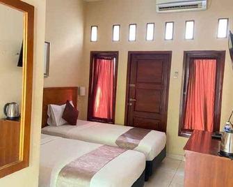 Hotel Puri Kayana - Serang City - Habitación