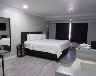 Capri Suites Anaheim - Anaheim - Habitación