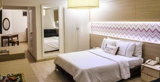 Hotel Ciudad Bonita - בוקאראמנגה - חדר שינה