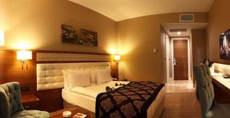 Revag Palace Hotel - Sivas - Camera da letto