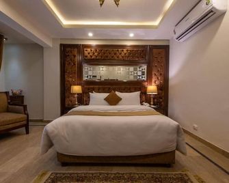 Envoy Continental Hotel, Blue Area, Islamabad - Ισλαμαμπάντ - Κρεβατοκάμαρα