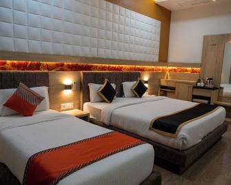The Grand Astoria Somnath - Somnāth - Bedroom