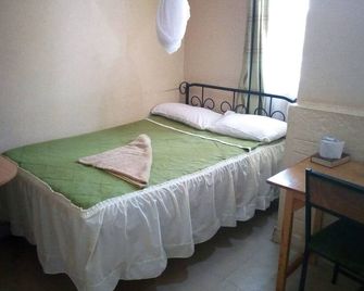Canan Guest House - Embu - Habitación