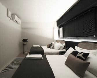 We2 Hotel - Taichung City - Bedroom