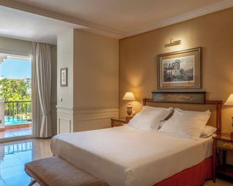 Guadalpin Suites - Марбелья - Спальня