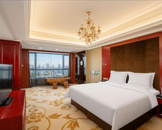 Huakang Dijing Grand Hotel Taiyuan - Taiyuan - Schlafzimmer