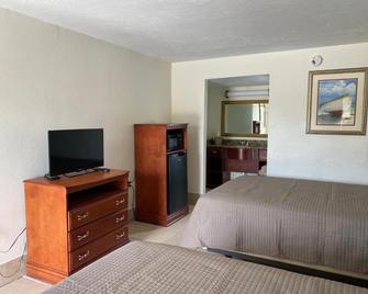 Jasmine Garden Inn - Lake City - Bedroom