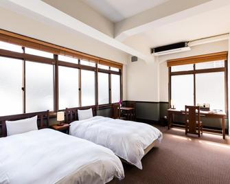 Auberge Toyooka 1925 - Toyooka - Schlafzimmer