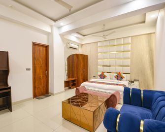 Fabhotel The Grand Paradise - Electronic City Metro Station - Ghāziābād - Bedroom