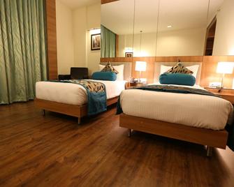 Misaki Hotel - Manesar - Bedroom