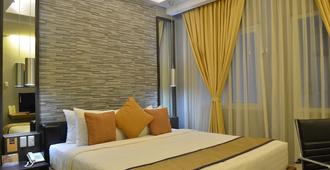 D'Hotel & Suites - Dipolog - Camera da letto