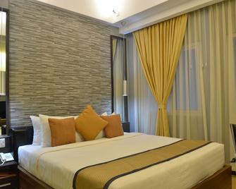 D' Hotel and Suites - Dipolog - Bedroom