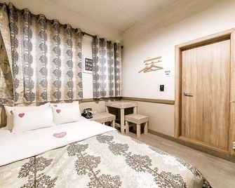 From H Suwon Station Amoremio Vintage - Suwon - Schlafzimmer