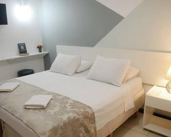Metro Hotel - Aguas de Lindoia - Спальня