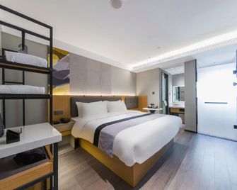 Home Inn Style Shanghai Railway Station Zhongxing Road Metro Station - שנחאי - חדר שינה