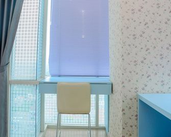 Best Location 1BR Apartment at Atlanta Residences By Travelio - Depok - Habitación
